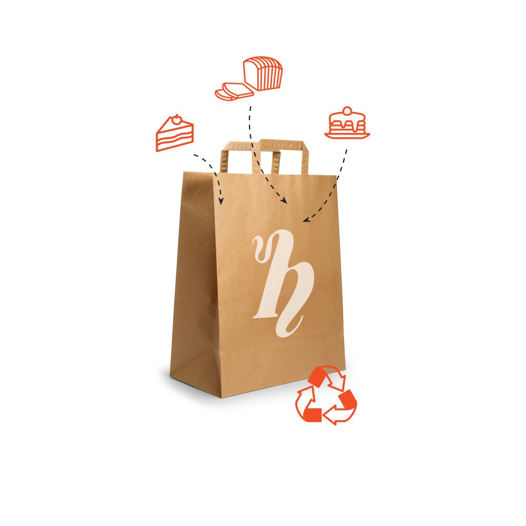folded paper bag with handle isolated on white background